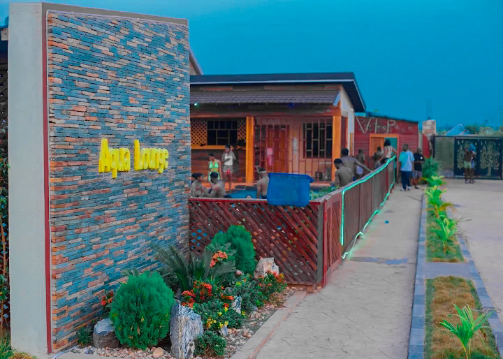 Aqua Lounge entrance and landscaped walkway at Enoba JB Event Center